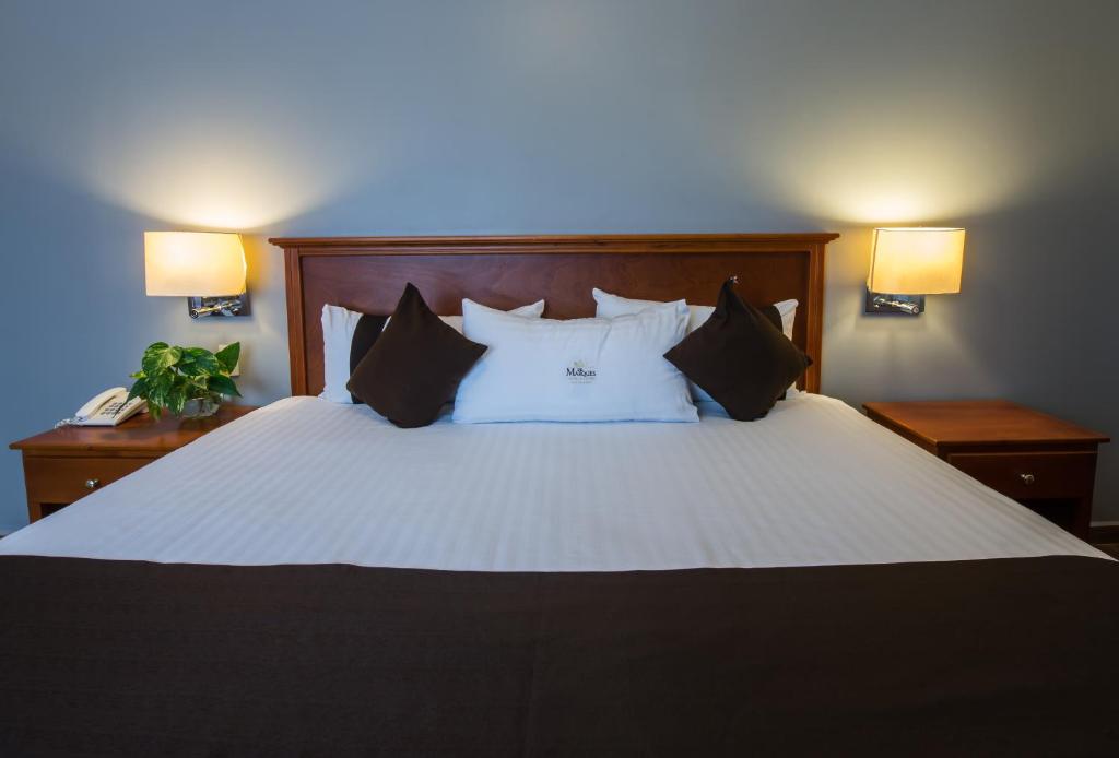 Postel nebo postele na pokoji v ubytování Del Marques Hotel and Suites