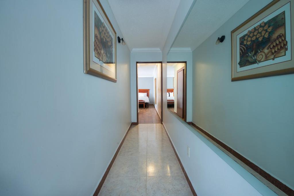 Postel nebo postele na pokoji v ubytování Del Marques Hotel and Suites
