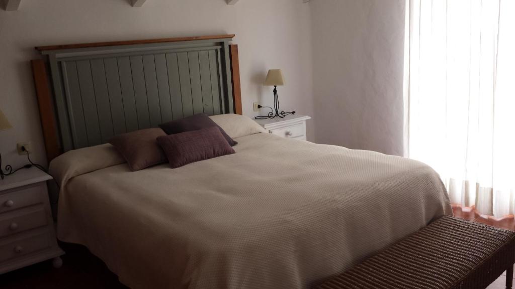 A bed or beds in a room at Casas Isabel