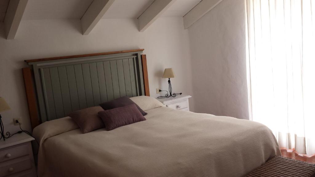 A bed or beds in a room at Casas Isabel