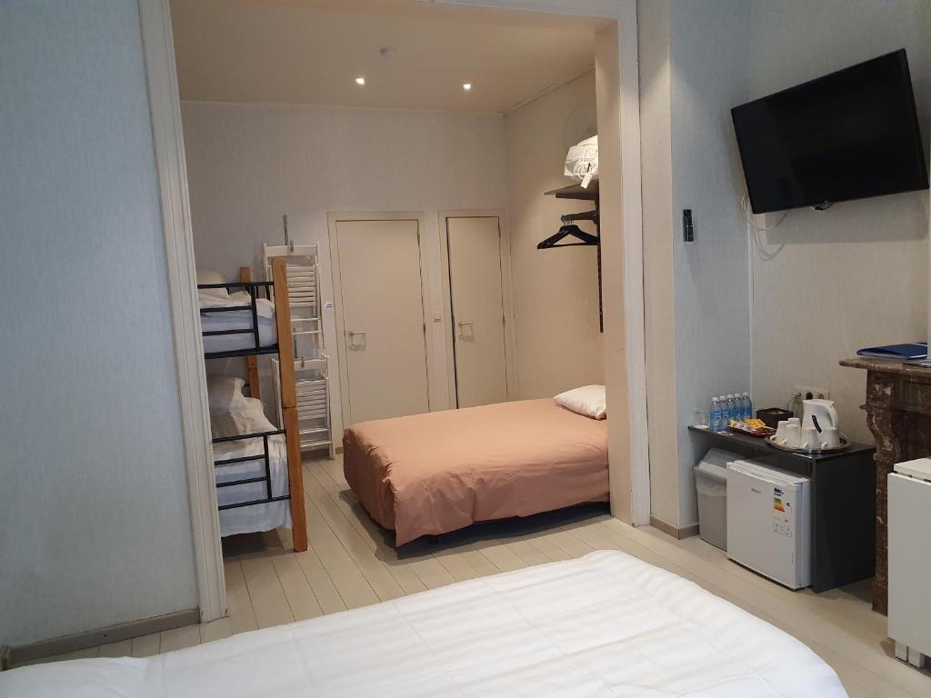 Postel nebo postele na pokoji v ubytování Albert - Rooms