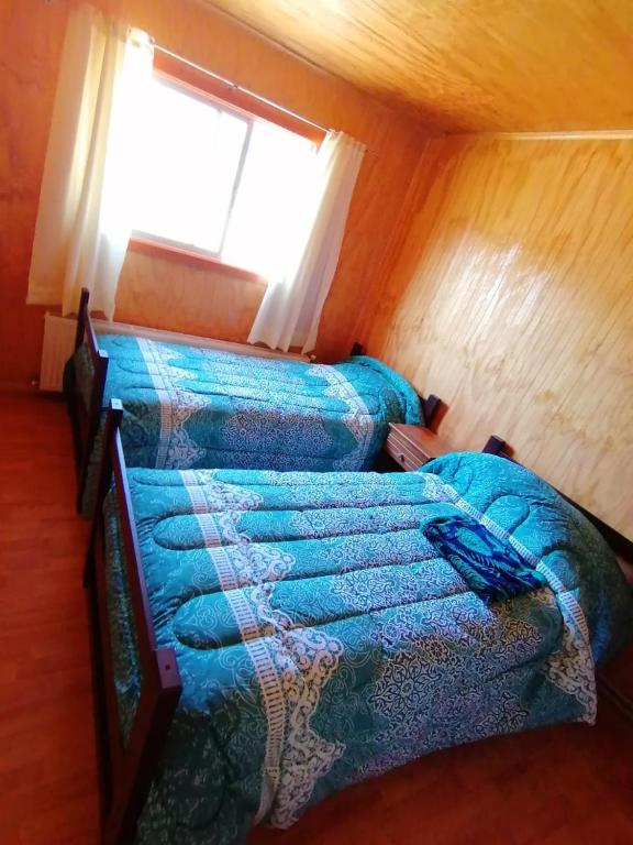 Katil atau katil-katil dalam bilik di Hostal Piedra Santa