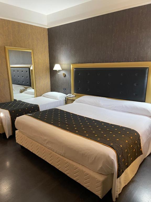 Postel nebo postele na pokoji v ubytování Hotel - Motel Flower