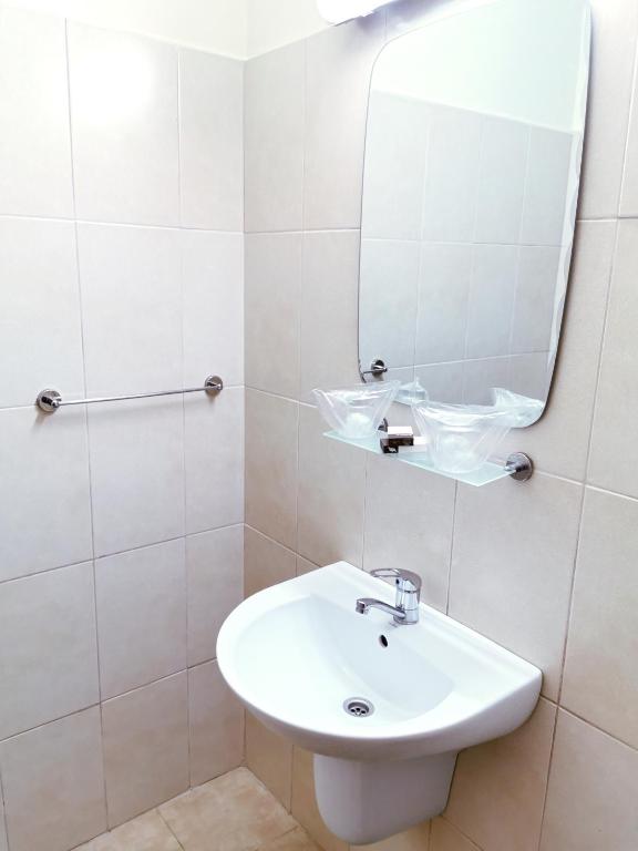 Koupelna v ubytování Hotel Muncel Băile Felix