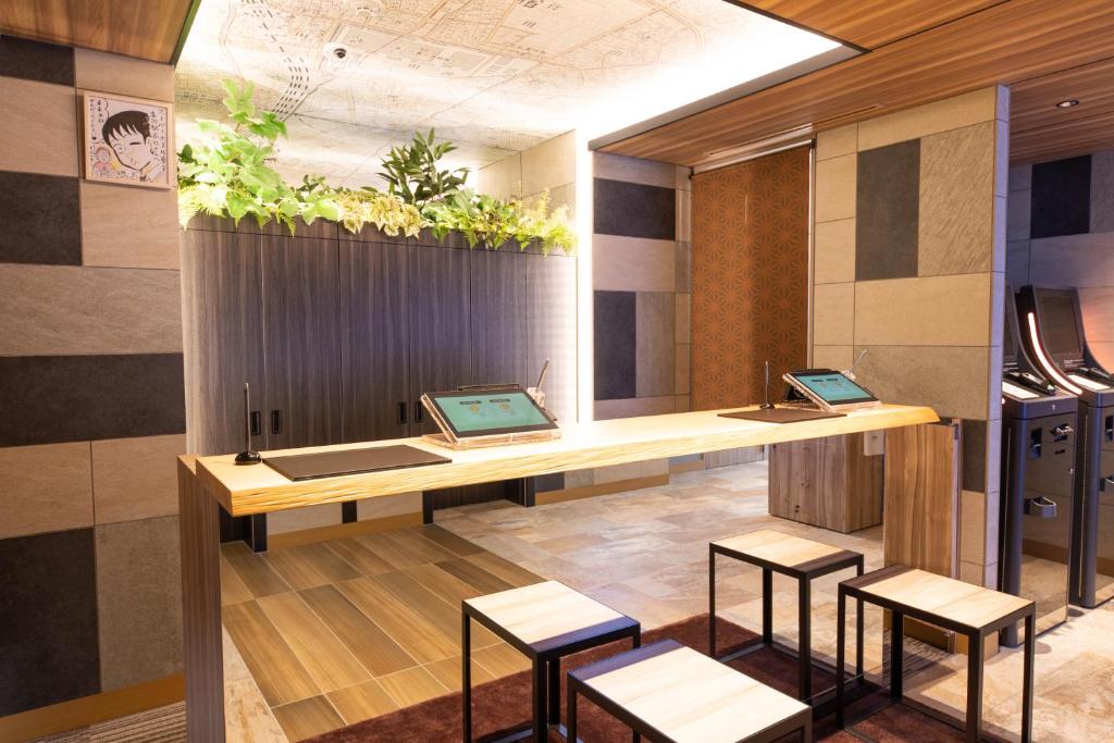 TV a/nebo společenská místnost v ubytování Super Hotel Tokyo Akabane Eki Minamiguchi