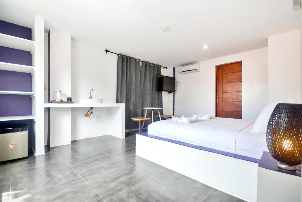 Postel nebo postele na pokoji v ubytování BABOSAM Hotel