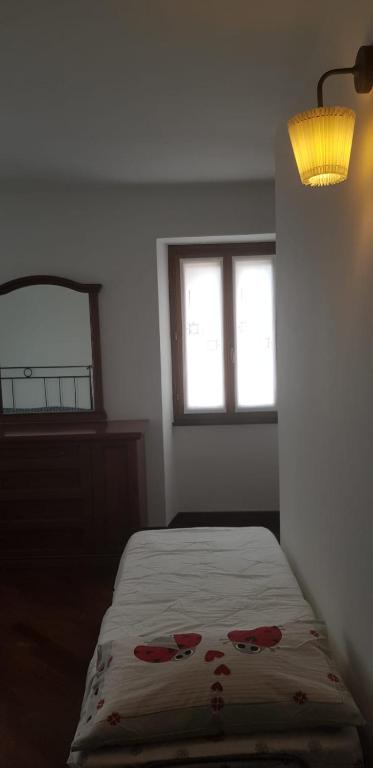 A bed or beds in a room at Il villino2