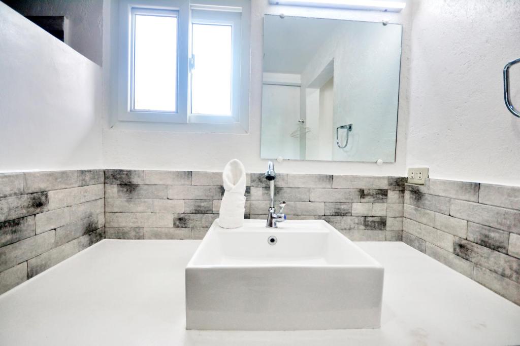 Koupelna v ubytování BABOSAM Hotel