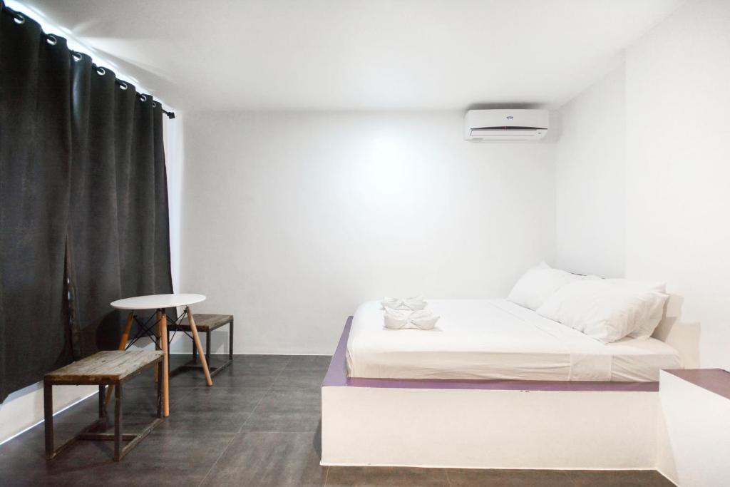 Postel nebo postele na pokoji v ubytování BABOSAM Hotel