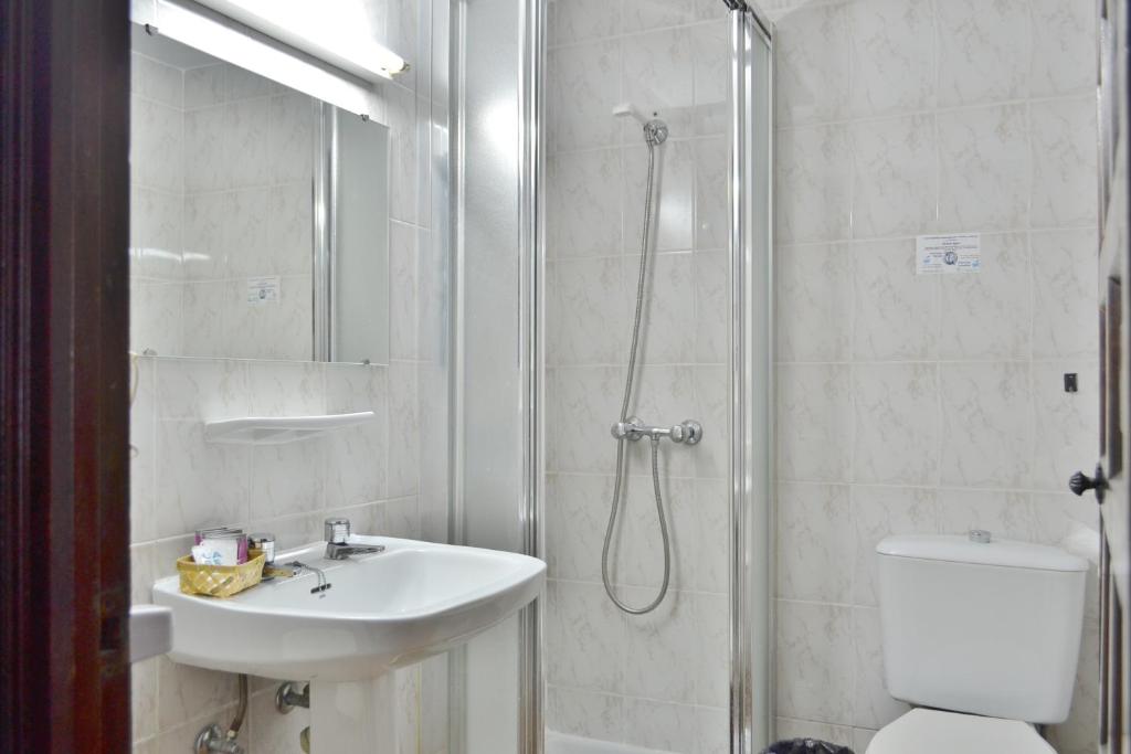 Koupelna v ubytování Hotel Marisa
