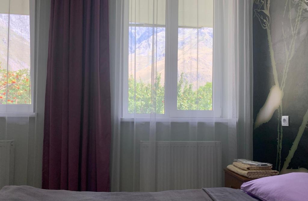 Ένα ή περισσότερα κρεβάτια σε δωμάτιο στο Guest House Demma
