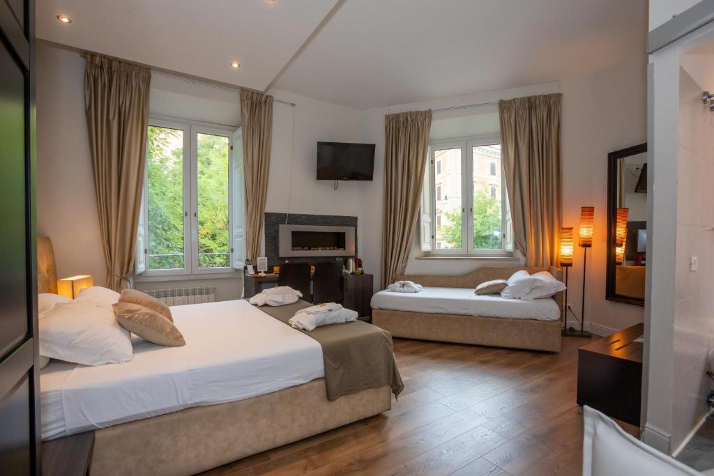 Posteľ alebo postele v izbe v ubytovaní Vatican Suites - The Luxury Leading Accommodation in Rome