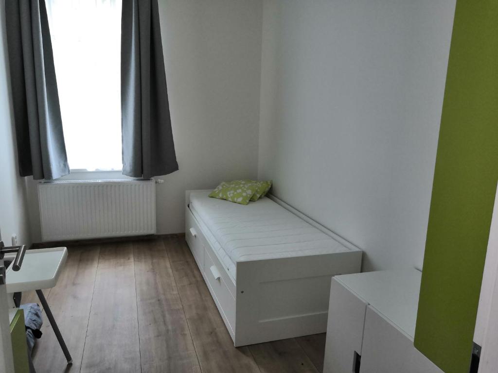 Postel nebo postele na pokoji v ubytování Znojmo apartmány