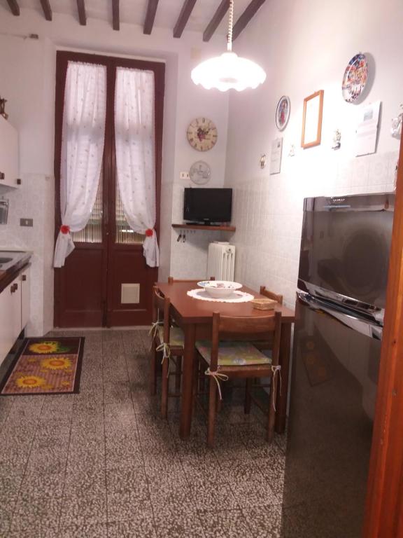 TV a/nebo společenská místnost v ubytování Casa Tarrini