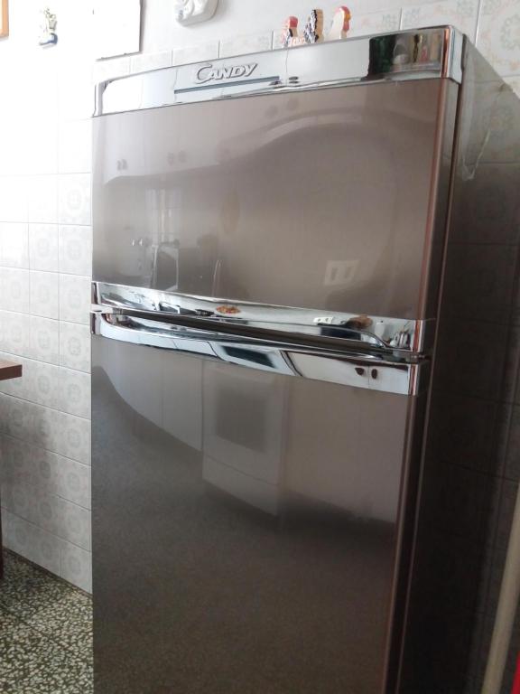 Kuchyň nebo kuchyňský kout v ubytování Casa Tarrini