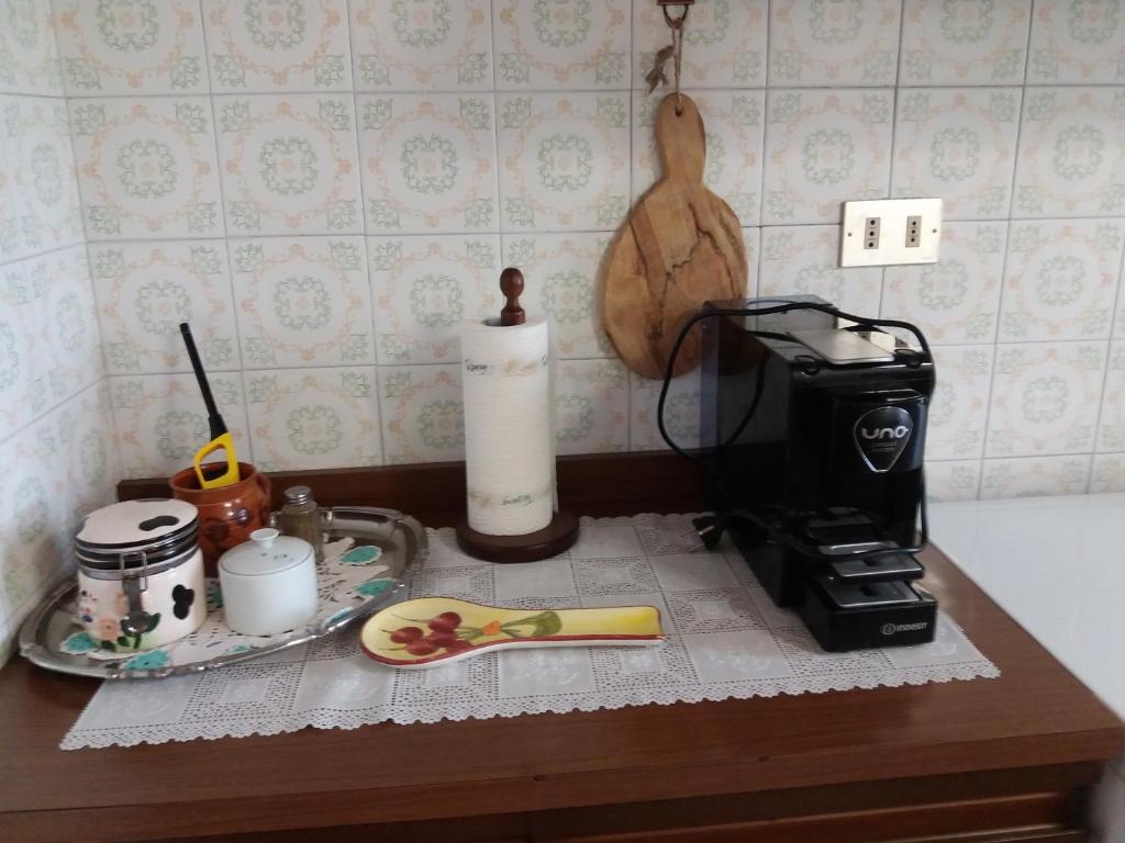 Příslušenství pro přípravu čaje a kávy v ubytování Casa Tarrini