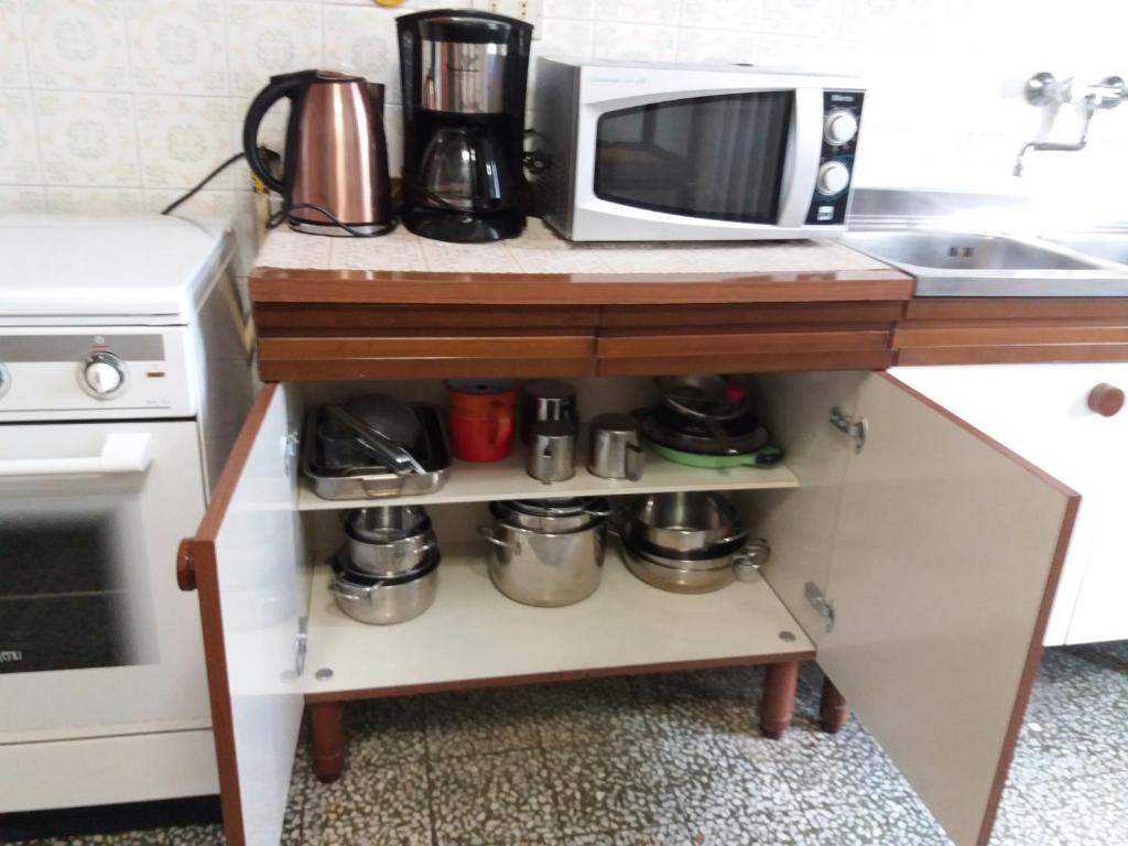 Kuchyň nebo kuchyňský kout v ubytování Casa Tarrini