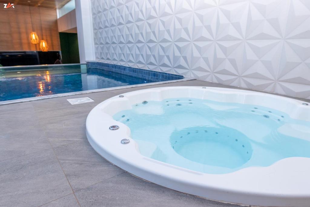 Bazén v ubytování Nova Hotel nebo v jeho okolí
