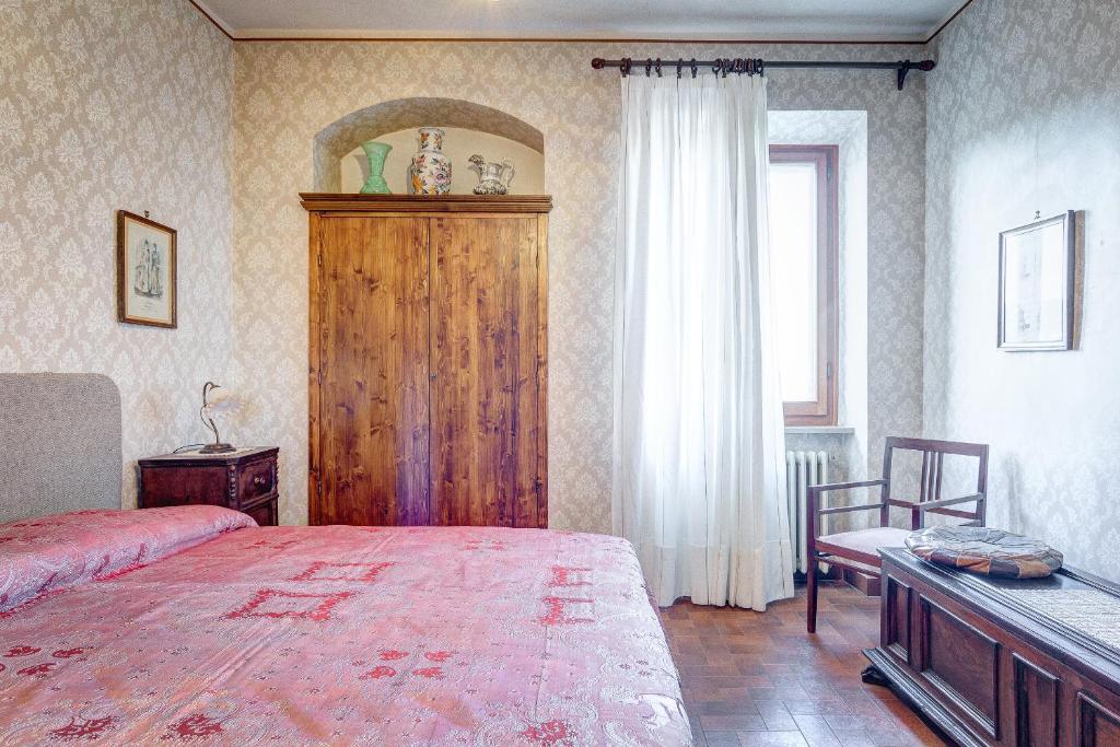 Postel nebo postele na pokoji v ubytování L’Arco