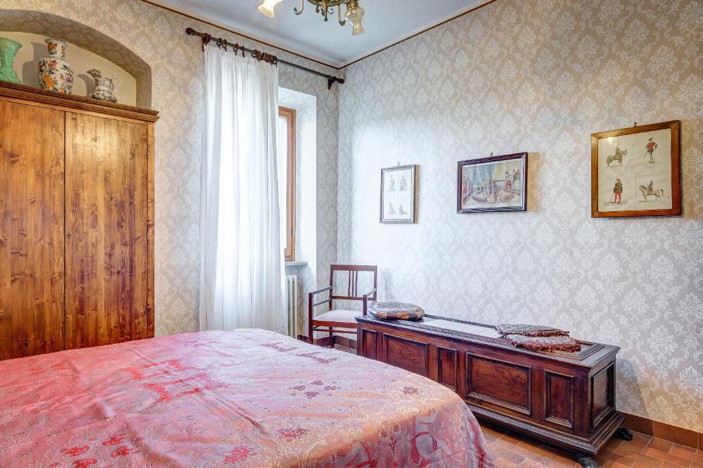 Postel nebo postele na pokoji v ubytování L’Arco