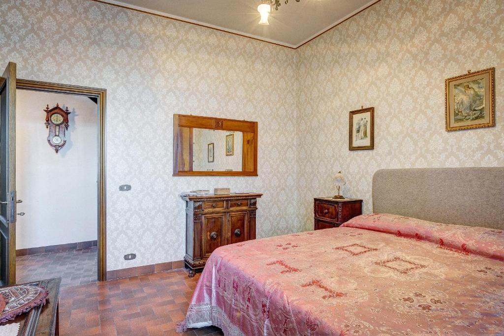 Postel nebo postele na pokoji v ubytování L’Arco