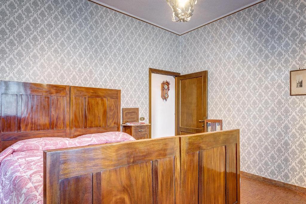 Postel nebo postele na pokoji v ubytování L’Arco