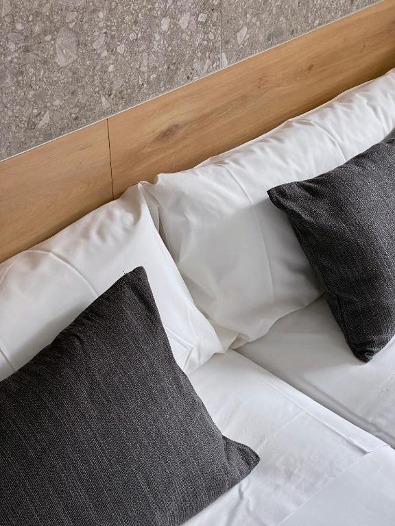 Postel nebo postele na pokoji v ubytování Hostal Espoz y Mina