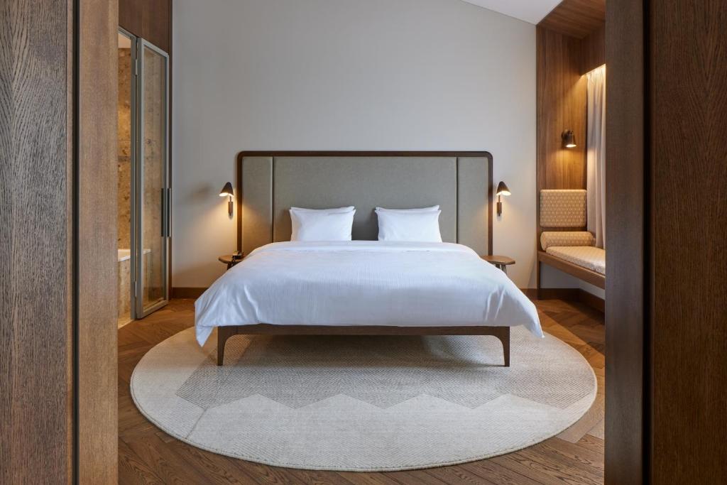 Postel nebo postele na pokoji v ubytování Neringa Hotel