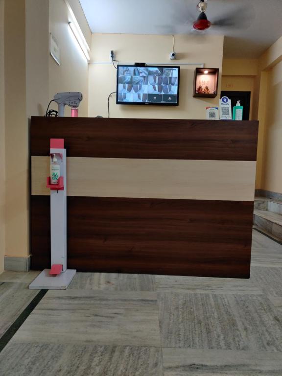 TV a/nebo společenská místnost v ubytování Sanjiva Suites