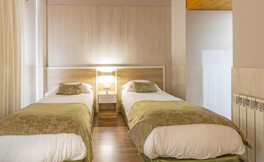 Postel nebo postele na pokoji v ubytování Hotel Princesa Parc