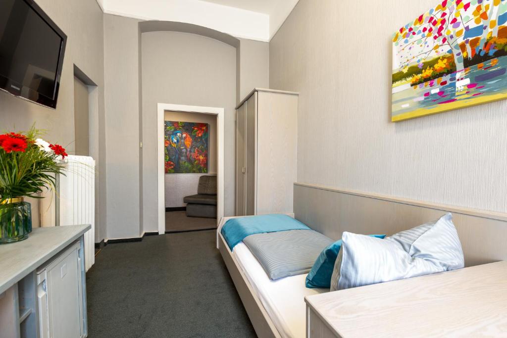 TV a/nebo společenská místnost v ubytování W22 Hotel am Kurfürstendamm