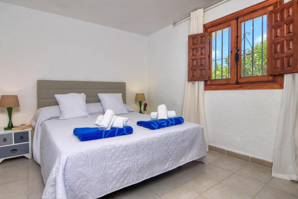 Posteľ alebo postele v izbe v ubytovaní Villa Margarita - A Tranquil Oasis with Large Private Pool