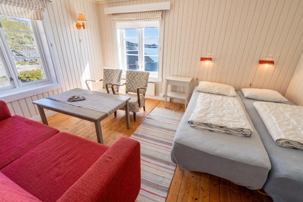 Postel nebo postele na pokoji v ubytování Lofoten Å HI hostel