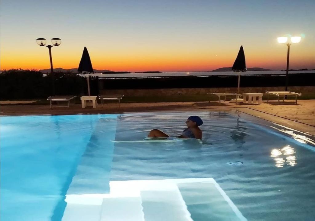 Bazén v ubytovaní Oasi Guzzetta Hotel&Case Vacanze alebo v jeho blízkosti