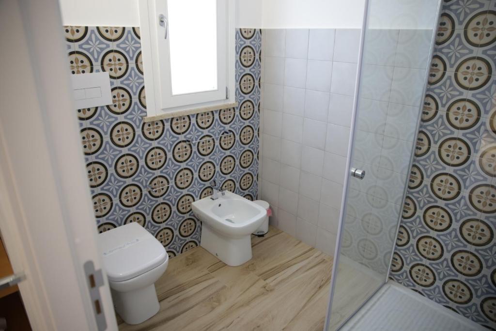 Kúpeľňa v ubytovaní Oasi Guzzetta Hotel&Case Vacanze