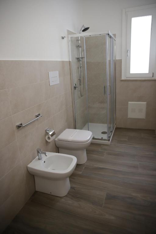 Kúpeľňa v ubytovaní Oasi Guzzetta Hotel&Case Vacanze
