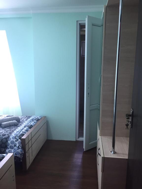 Postel nebo postele na pokoji v ubytování MATE Private Bathrooms