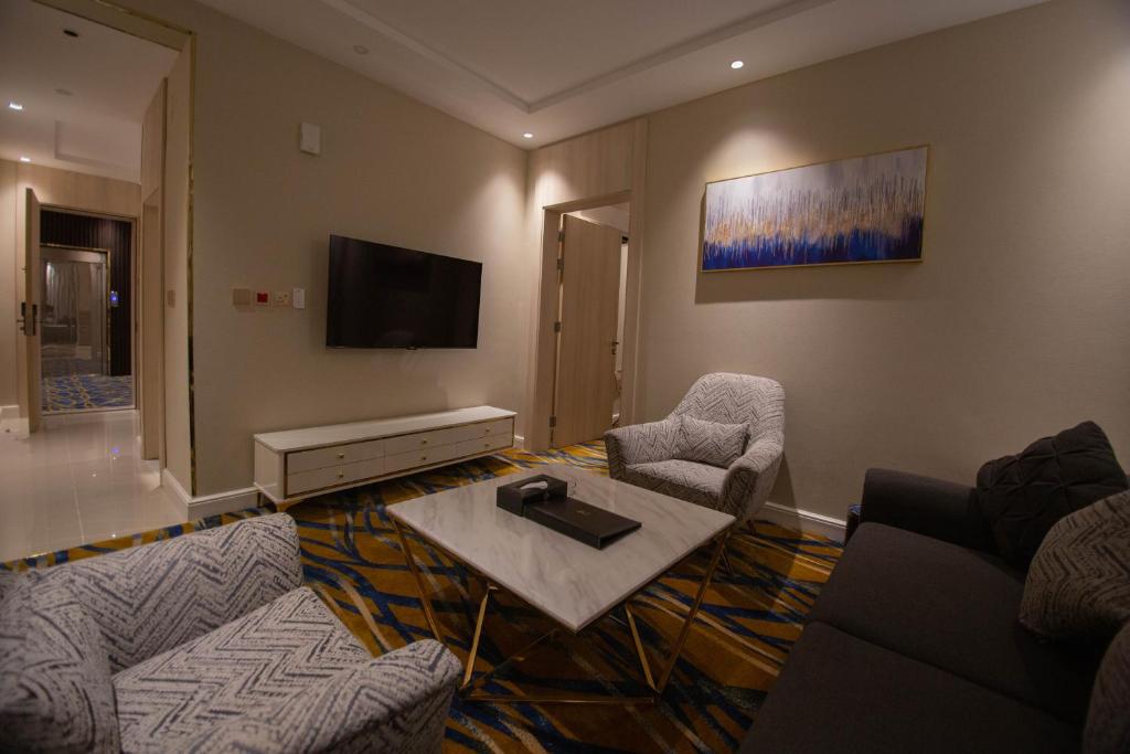 TV a/nebo společenská místnost v ubytování فندق قوبا السويس - Quba Swess Hotel Jazan