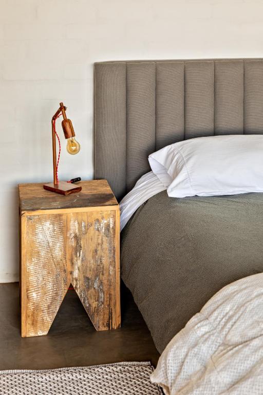 Cama o camas de una habitación en Mataka'a - Chalé Industrial na Mantiqueira
