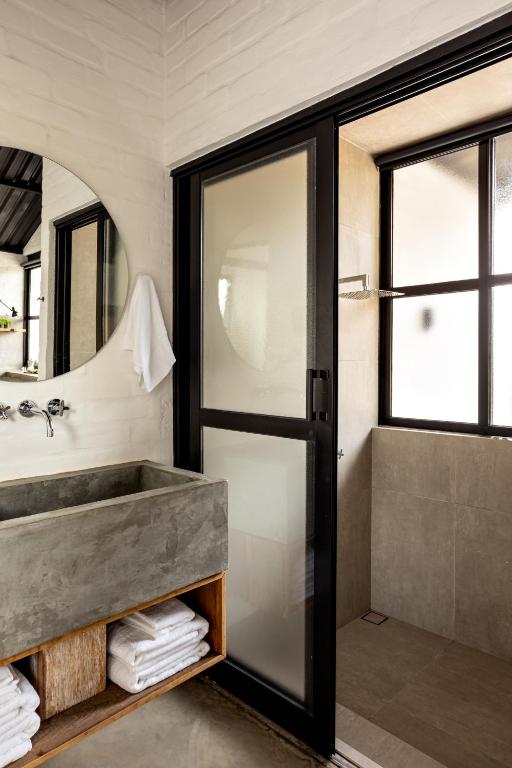 Cama o camas de una habitación en Mataka'a - Chalé Industrial na Mantiqueira