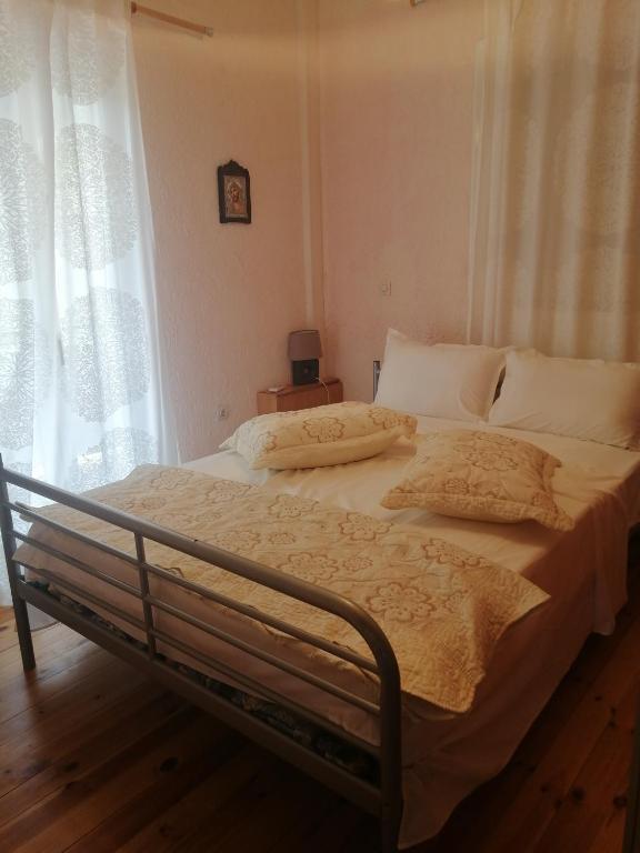 Postel nebo postele na pokoji v ubytování Platanos Estate