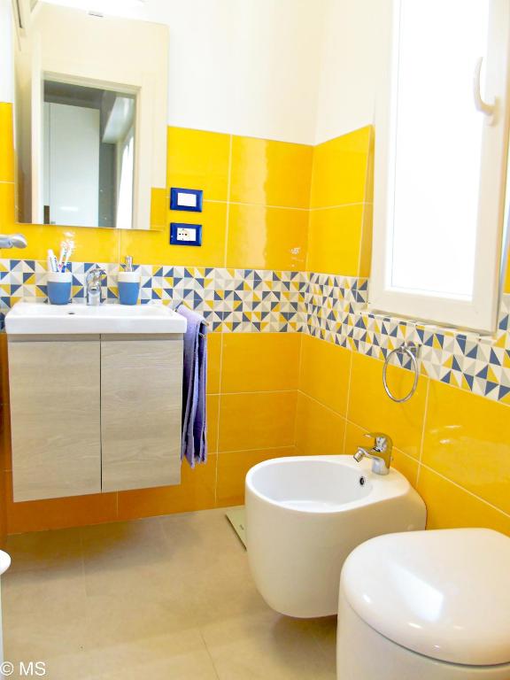 Kúpeľňa v ubytovaní Pietra Home, posto auto, AC ,WIFI, 150mt dal mare