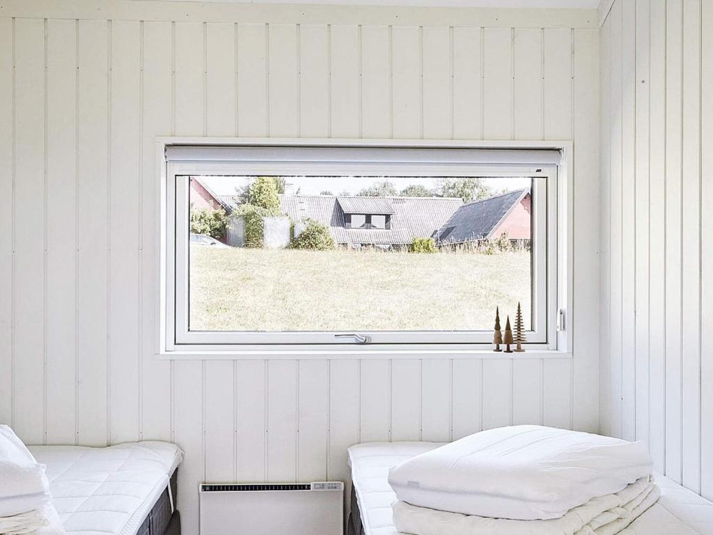 Postel nebo postele na pokoji v ubytování 8 person holiday home in Slagelse-By Traum