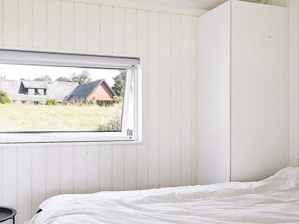 Postel nebo postele na pokoji v ubytování 8 person holiday home in Slagelse-By Traum