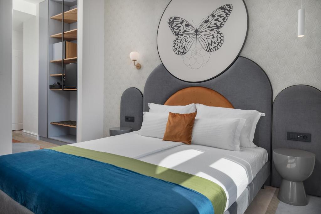 Postel nebo postele na pokoji v ubytování Heritage Hotel Porin Makarska