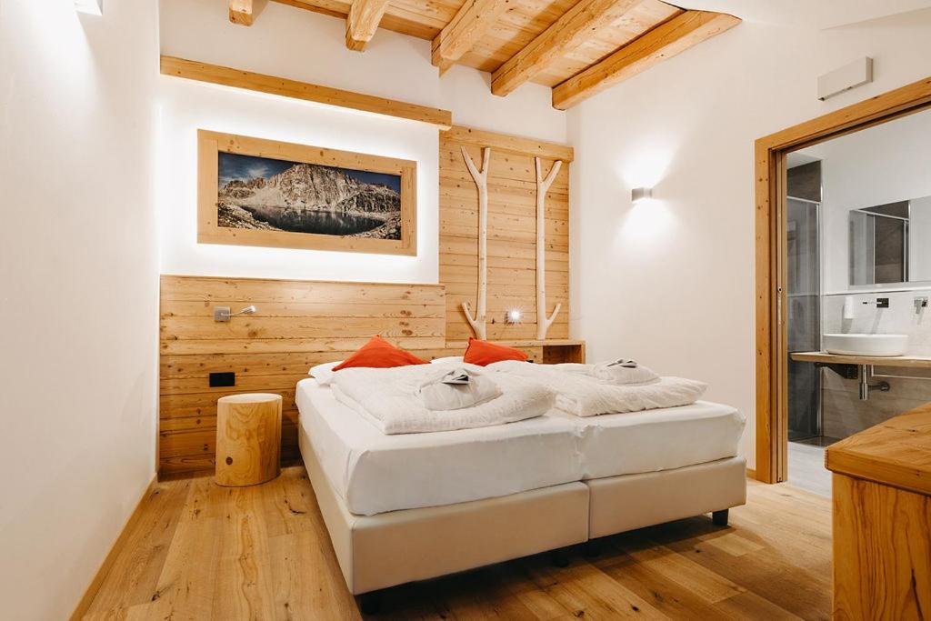 Postel nebo postele na pokoji v ubytování Hotel Aurai