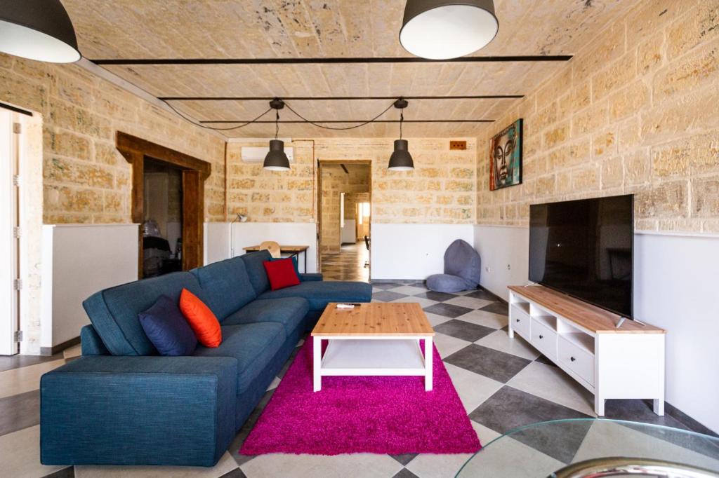 Ruang duduk di Valletta Collection - St Pauls Apartment