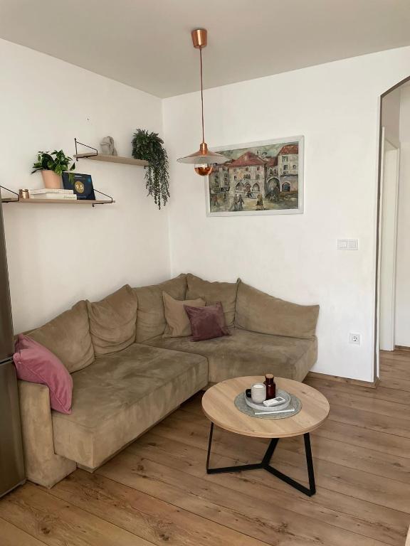 Uma área de estar em Apartment Ria