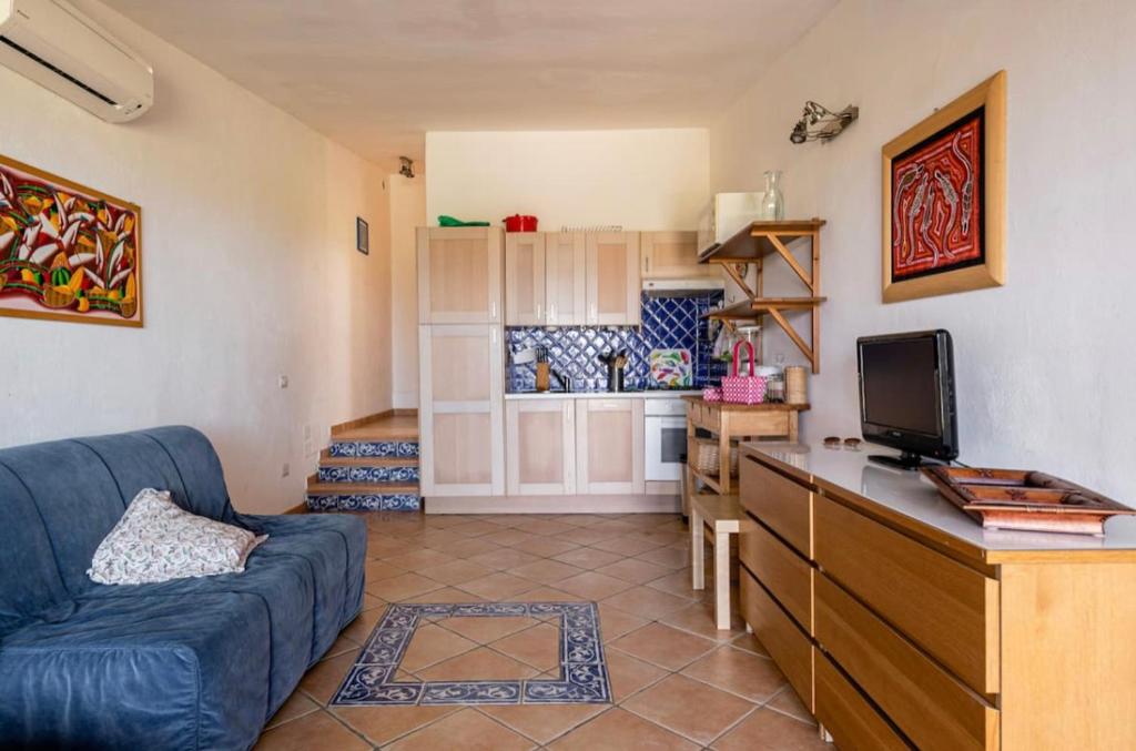 Kuchyňa alebo kuchynka v ubytovaní Villetta a schiera con giardino - porto pollo