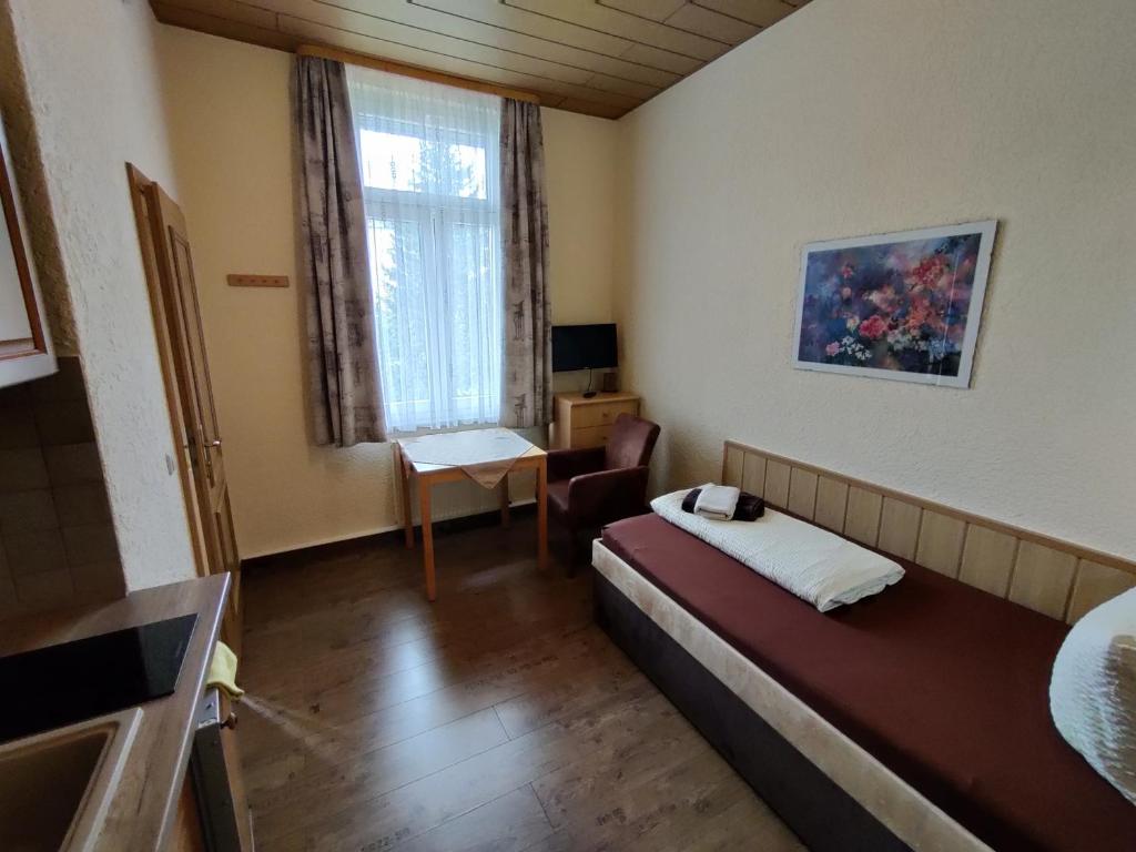 Кровать или кровати в номере Appartementhaus Savina